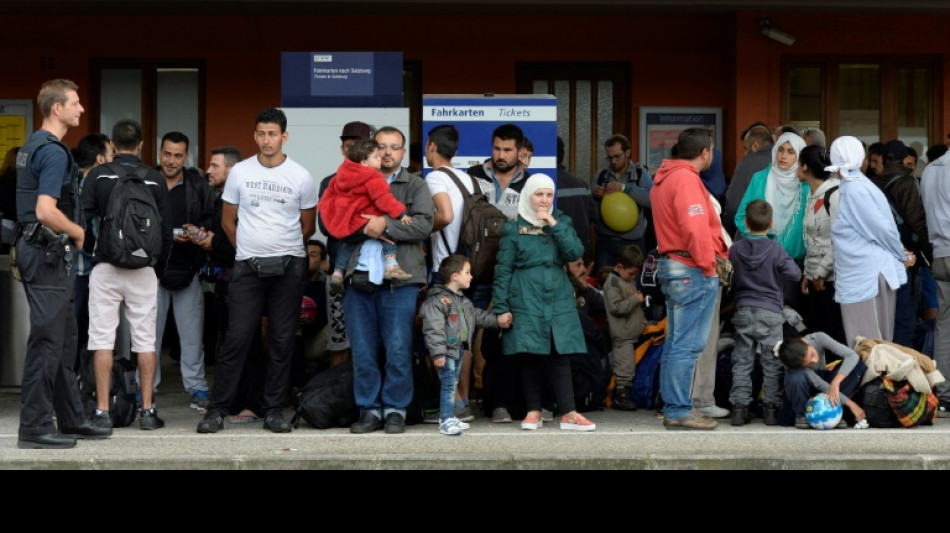 Merz will weniger als 100.000 Fl&uuml;chtlinge im Jahr