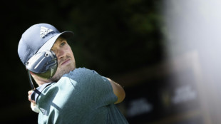 England's Mansell leads at rainswept Dunhill Links