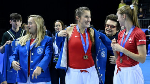 Swiss women beat Australia to win Billie Jean King Cup