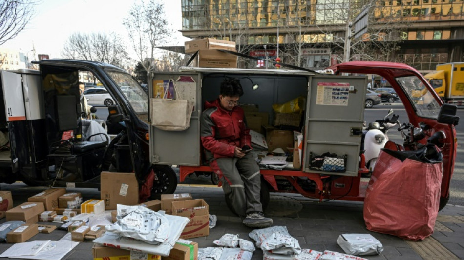 "Pas d'argent" &agrave; d&eacute;penser: dans les rues de P&eacute;kin, la crise &eacute;conomique inqui&egrave;te