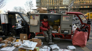 "Pas d'argent" &agrave; d&eacute;penser: dans les rues de P&eacute;kin, la crise &eacute;conomique inqui&egrave;te