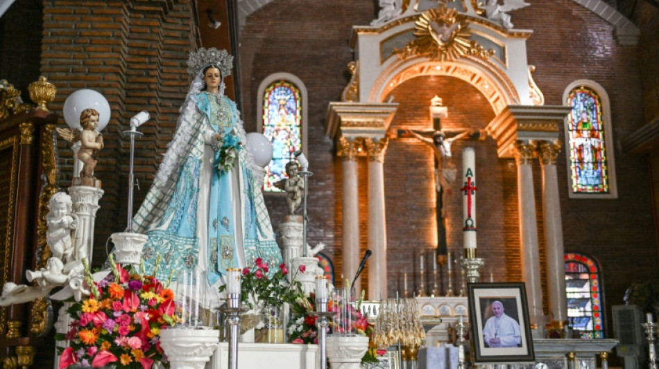 Prayers, pride in Philippine papal contender's hometown