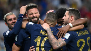Giroud equals Henry record as World Cup holders France sink Australia 