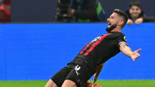 Giroud fires AC Milan past Salzburg and into Champions League knockouts