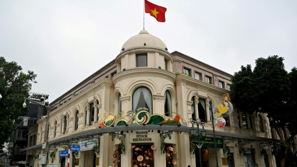 Asian stocks mixed as traders shrug at US-Vietnam trade deal