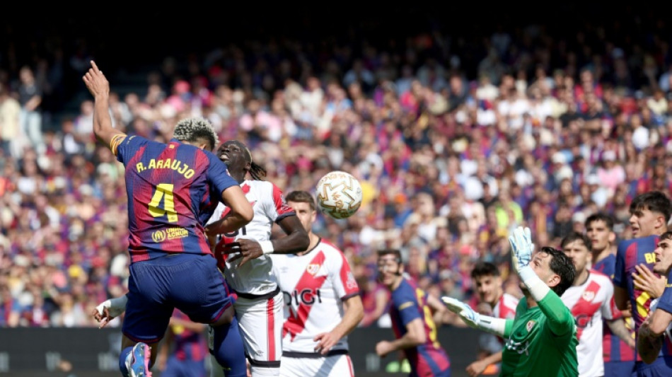 Araujo header scrapes Liga leaders Barca win over Rayo