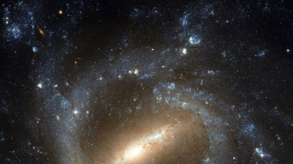 D&eacute;couverte d'une galaxie remarquable dans l'Univers jeune