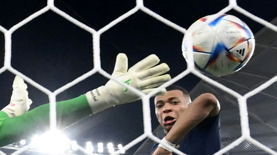 Mbappe double as France reach World Cup last 16, Lewandowski off the mark