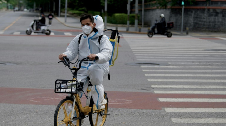 Nuevas restricciones anticovid convierten a Pek&iacute;n en una ciudad fantasma