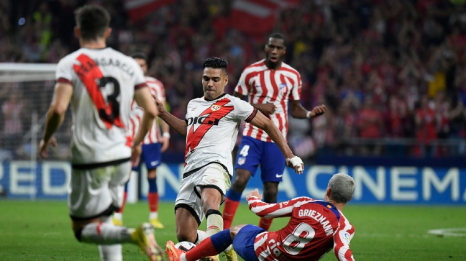 Falcao penalty snatches Rayo draw at Atletico, Sevilla hold Valencia