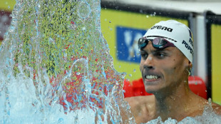 Romanian Popovici, 17, wins men's 200m freestyle world title&nbsp;