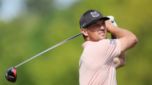 Leaner DeChambeau still brings power to lead at PGA