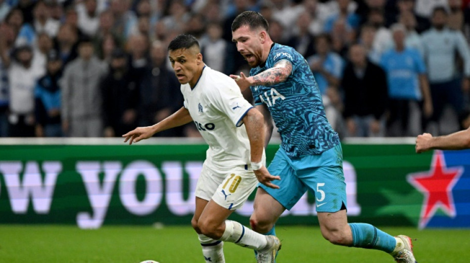 Tottenham sink Marseille to reach Champions League last 16