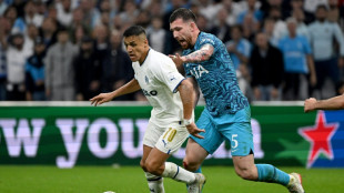 Tottenham sink Marseille to reach Champions League last 16