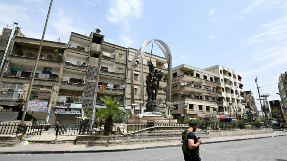 Syria's Druze take up arms to defend their town against Islamists
