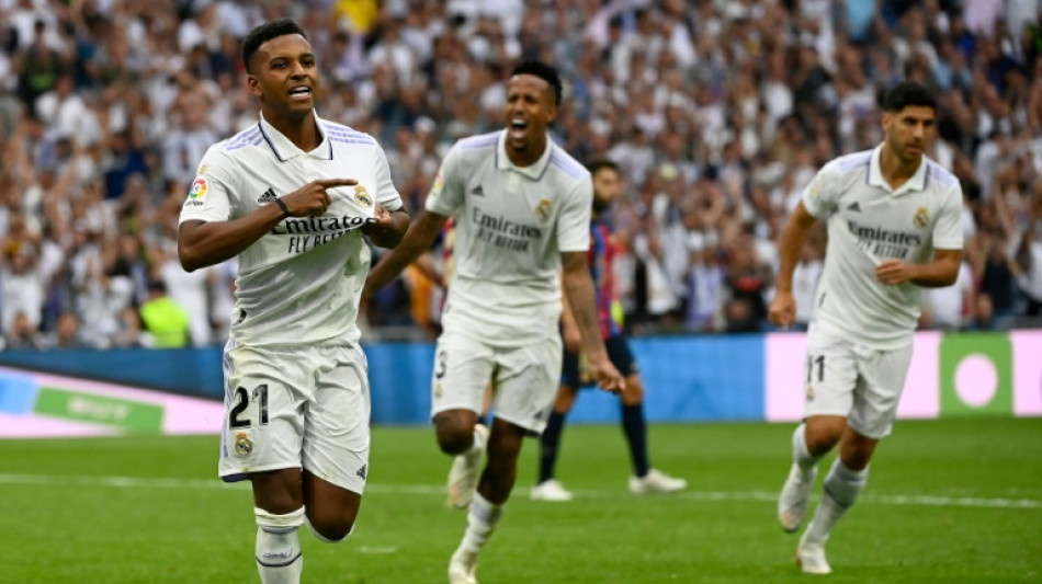 Unbeaten Madrid defeat Barcelona in Clasico to top La Liga