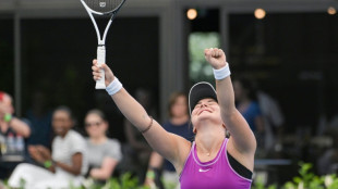 Andreescu makes gritty comeback to beat Muguruza in Adelaide 