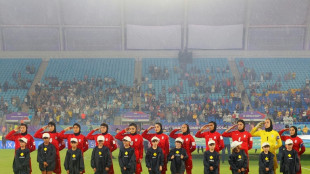 Iran players salute and sing national anthem at Women's Asian Cup