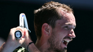 Medvedev battles into Melbourne third round after early scare