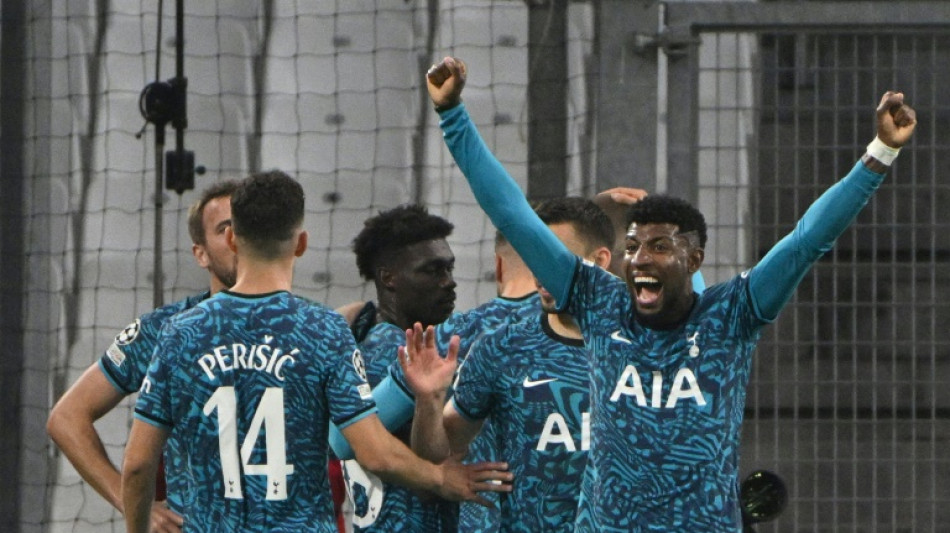 Tottenham reach Champions League last 16 as group winners after late drama