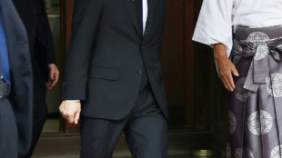 Japan defence minister visits war shrine, PM stays away