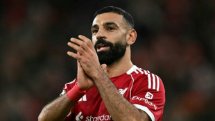 Salah back in Liverpool fold as Arsenal grab last-gasp win