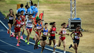Rain-sodden Cambodian badly loses race, but wins hearts