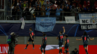 Alvarez and Doku strike late to push Man City past Leipzig