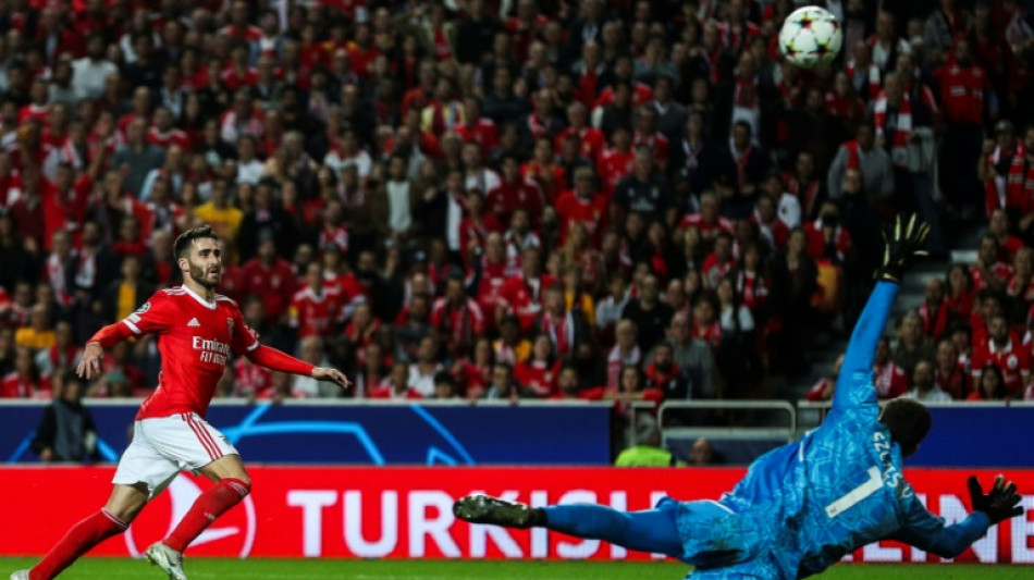 Benfica win thriller with Juve to reach Champions League knockouts