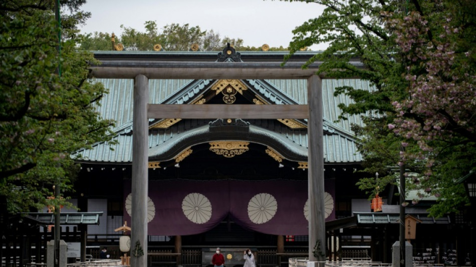 Japan PM hopeful avoids war shrine visit amid political wrangle