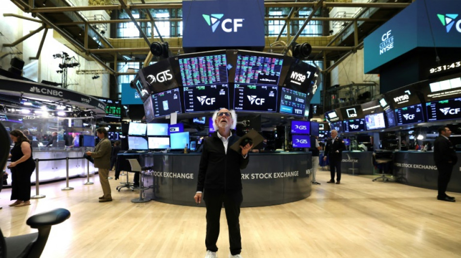 Wall Street ouvre en hausse, suspendue au discours du patron de la Fed