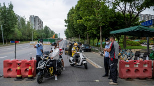 Covid: des millions d'habitants confin&eacute;s dans l'une des plus grandes villes de Chine