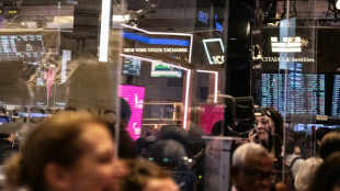 Wall Street ouvre en hausse, finalement enthousiasm&eacute;e par la Fed
