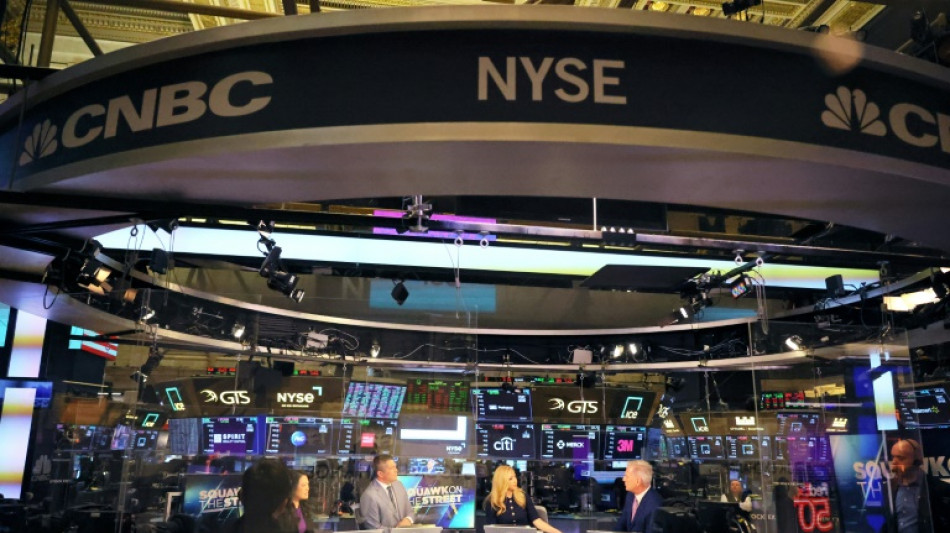 Wall Street ferme divis&eacute;e au d&eacute;but d'une semaine de r&eacute;sultats cruciale