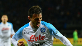 Napoli eight points clear after fighting past rivals Atalanta