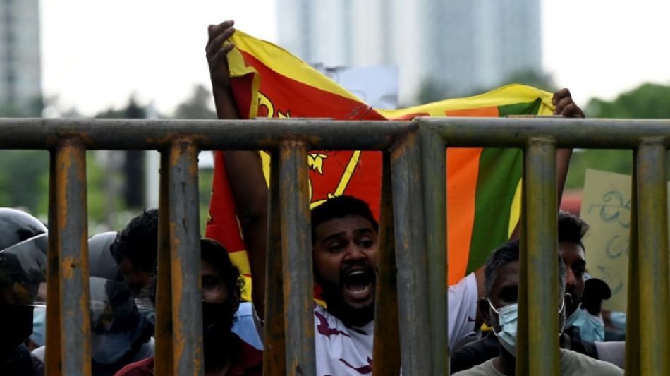 Sri Lanka asks experts to plan debt restructure as protests rage