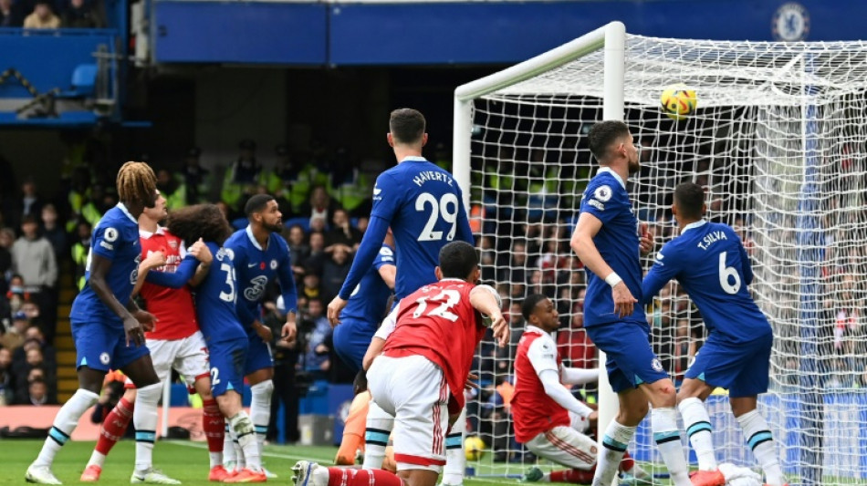 Gabriel sends Arsenal top as Chelsea crash again