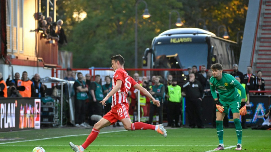 Union stun Dortmund and stay top after Kobel error