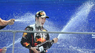 Perez wins in Singapore rain as Verstappen made to wait for title
