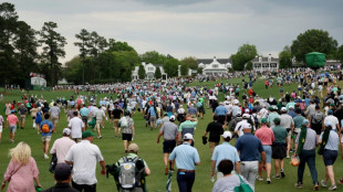 Masters play suspended due to bad weather