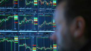 Wall Street termine mitig&eacute;e: le Dow Jones  et le S&P 500 sur de nouveaux records