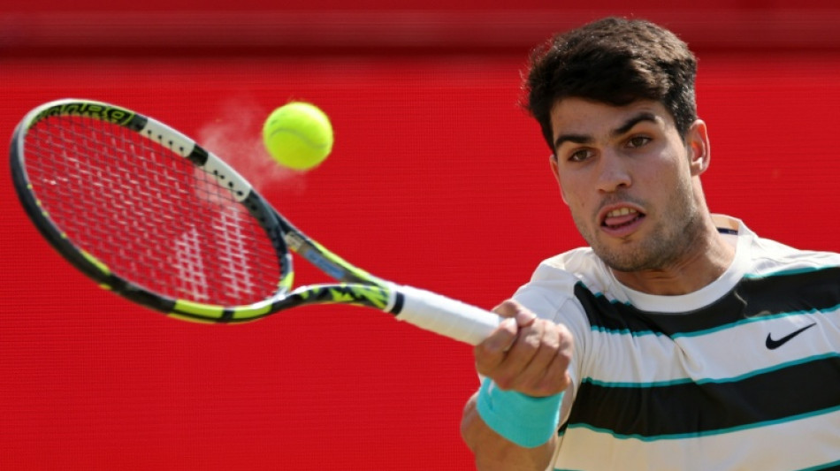 Alcaraz wins testing Queen's opener, Fritz, Shelton out