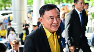 Thai ex-PM Thaksin lands in Bangkok ahead of crucial court date