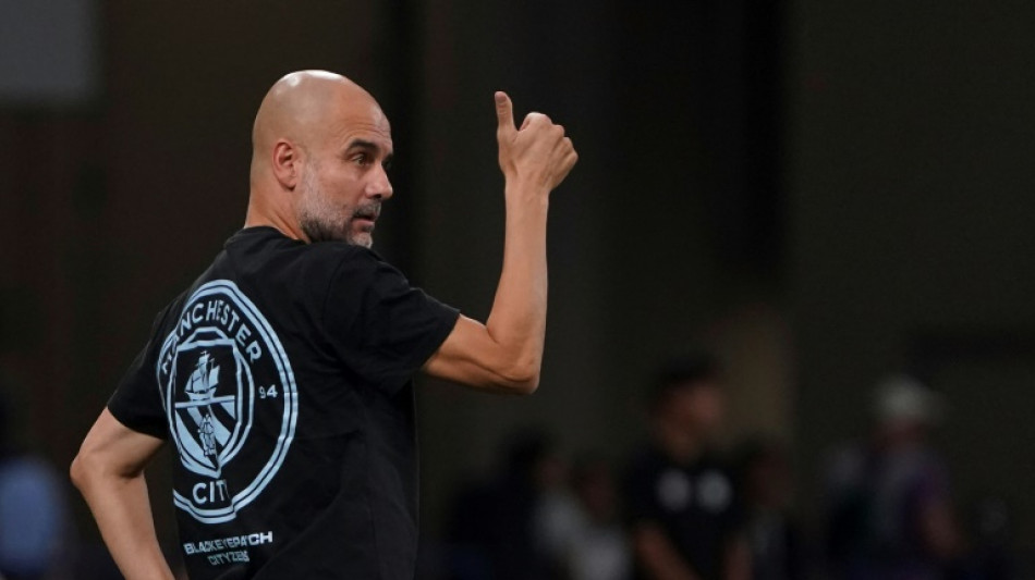 Guardiola says Man City treble 'once in a lifetime' feat