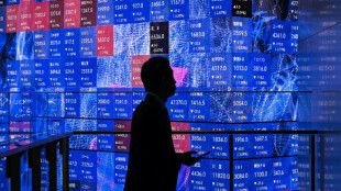 Stocks reverse as investors await news on US-Iran peace talks