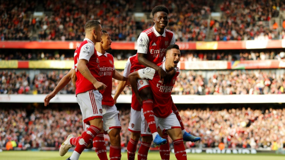 Arsenal beat Liverpool to go top, Ronaldo hits 700 in Man Utd win