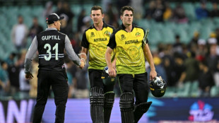 'Hurt' for holders Australia but England make winning World Cup start