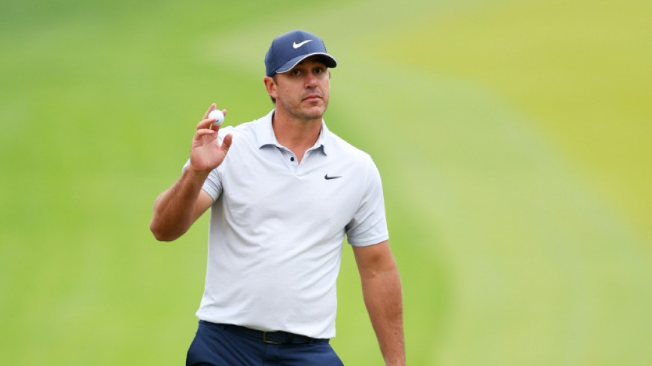 Koepka turns boos to roars in grabbing PGA lead at rainy Oak Hill
