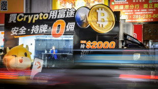 Asian markets mixed as bitcoin surges to new high