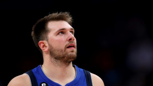 Doncic triple-double carries Mavs past Warriors